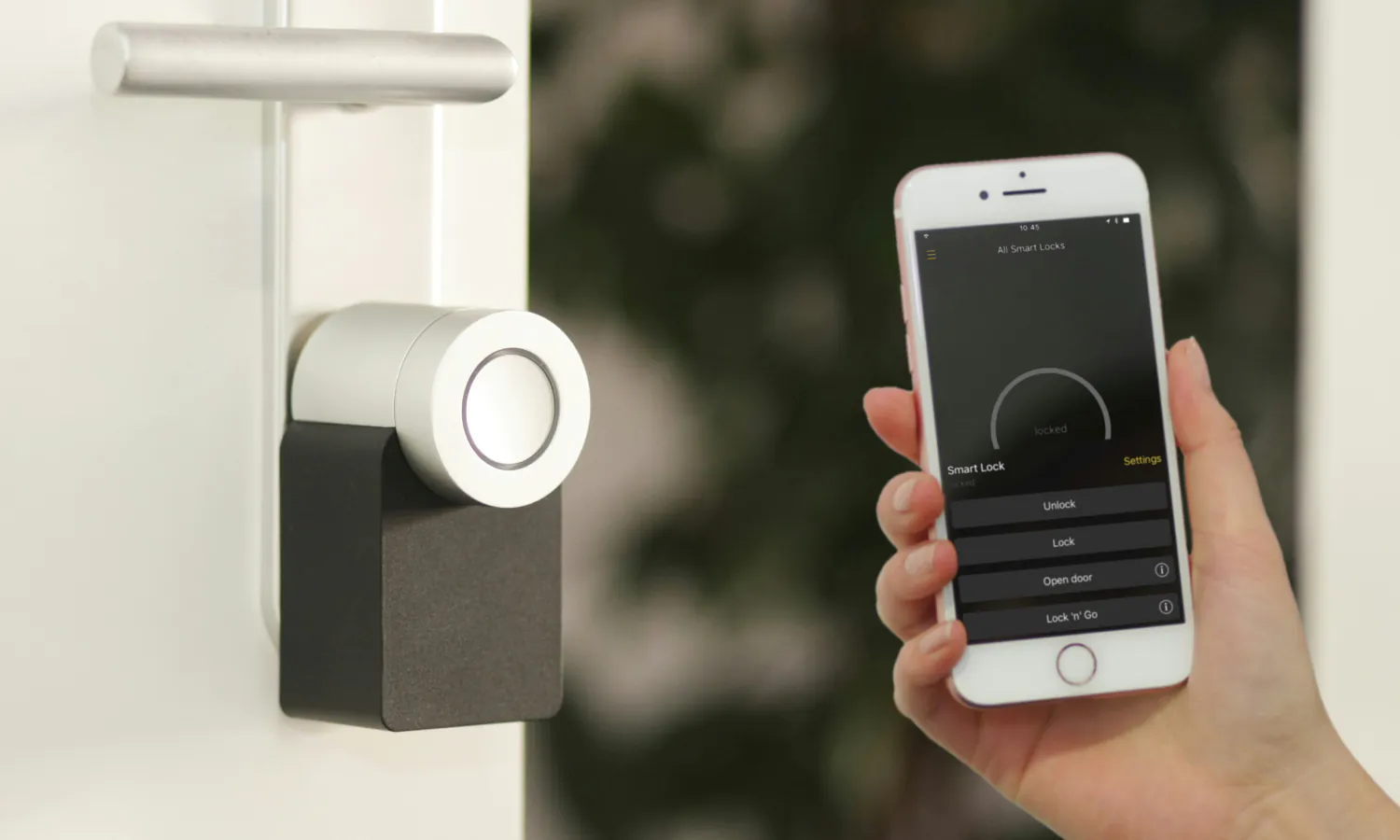 An iPhone is being used to unlock a smartlock system